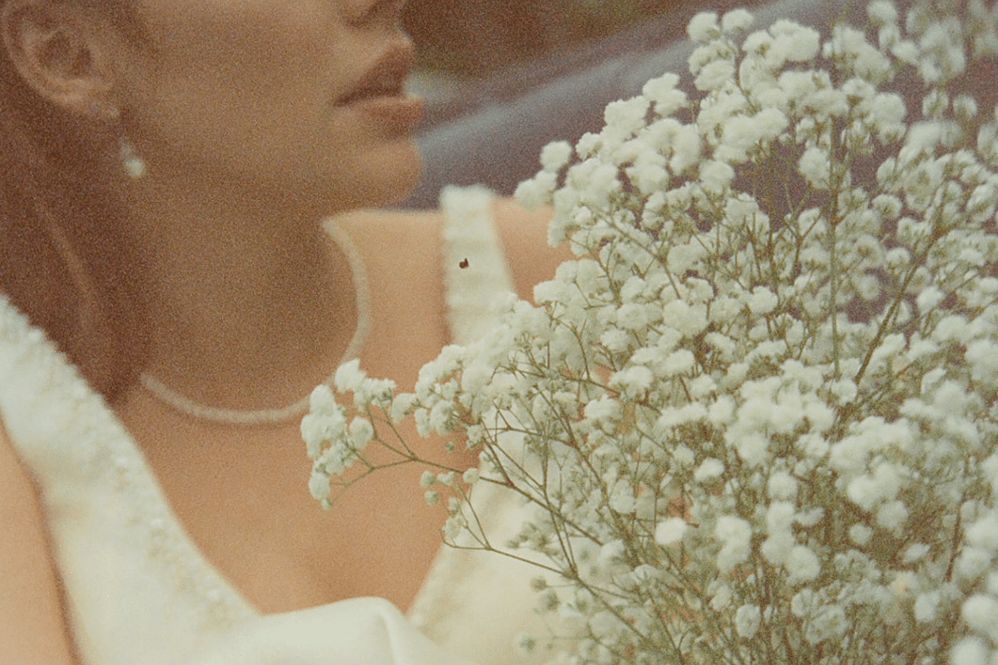 A film shot close up of a bride on her wedding day