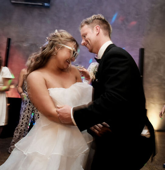 Wedding DJ Reception Dance Floor at Factory 51 Brisbane Couple dancing in front of a wedding DJ at a Brisbane reception with guests enjoying the dance floor