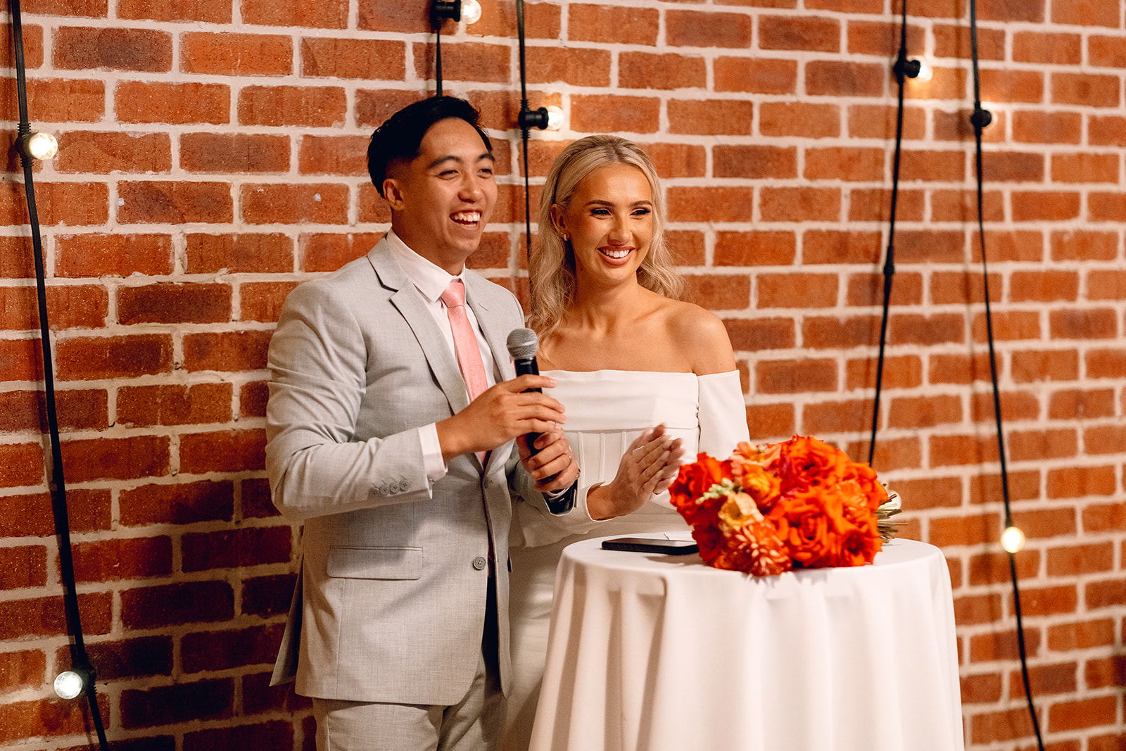Bride and Groom sharing a speech at Factory51 wedding venue