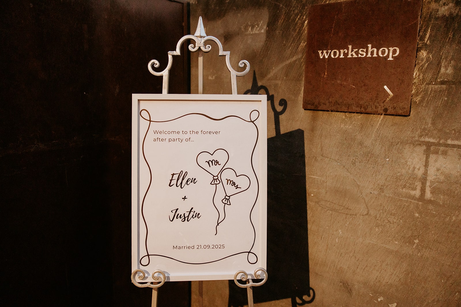 Ellen and Justin’s wedding welcome sign outside The Workshop at Factory51