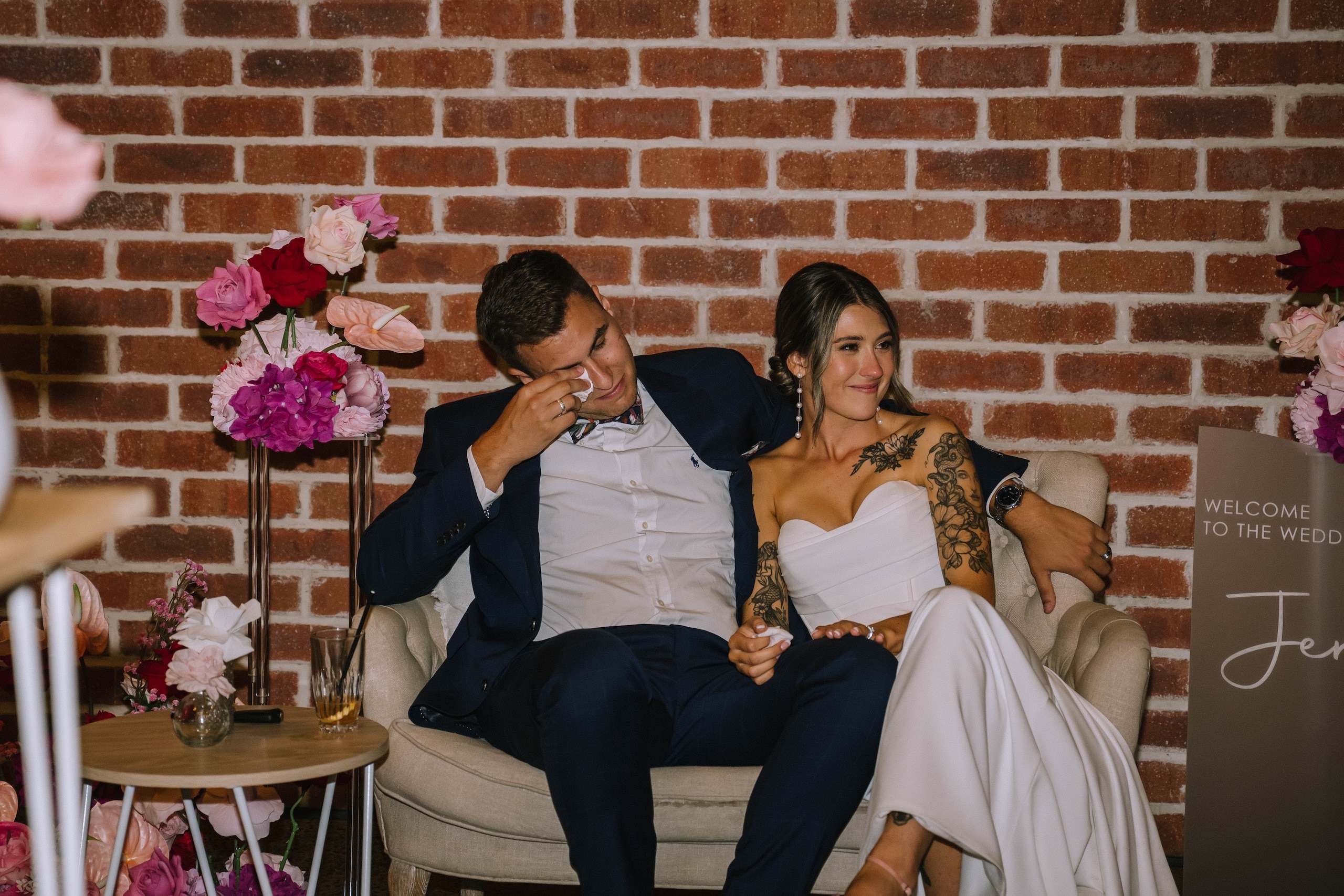 Indi and Jeremy sharing an emotional moment during speeches at their Factory51 wedding