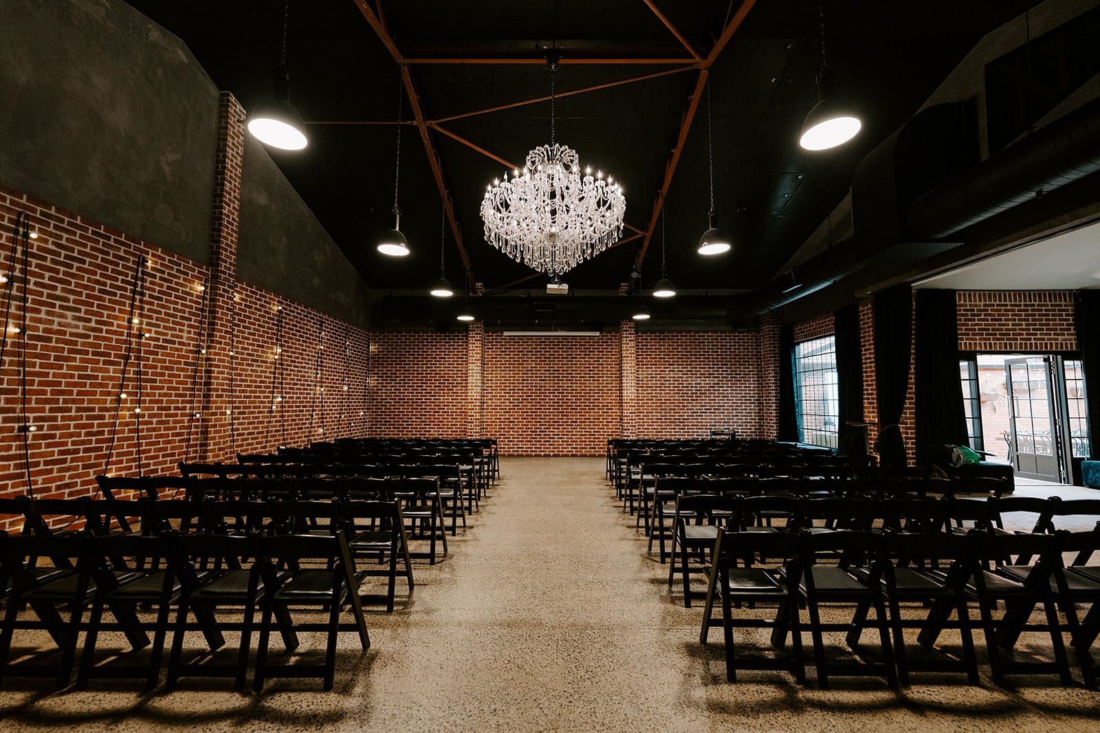 Industrial chic ceremony set up at Factory51 wedding venue